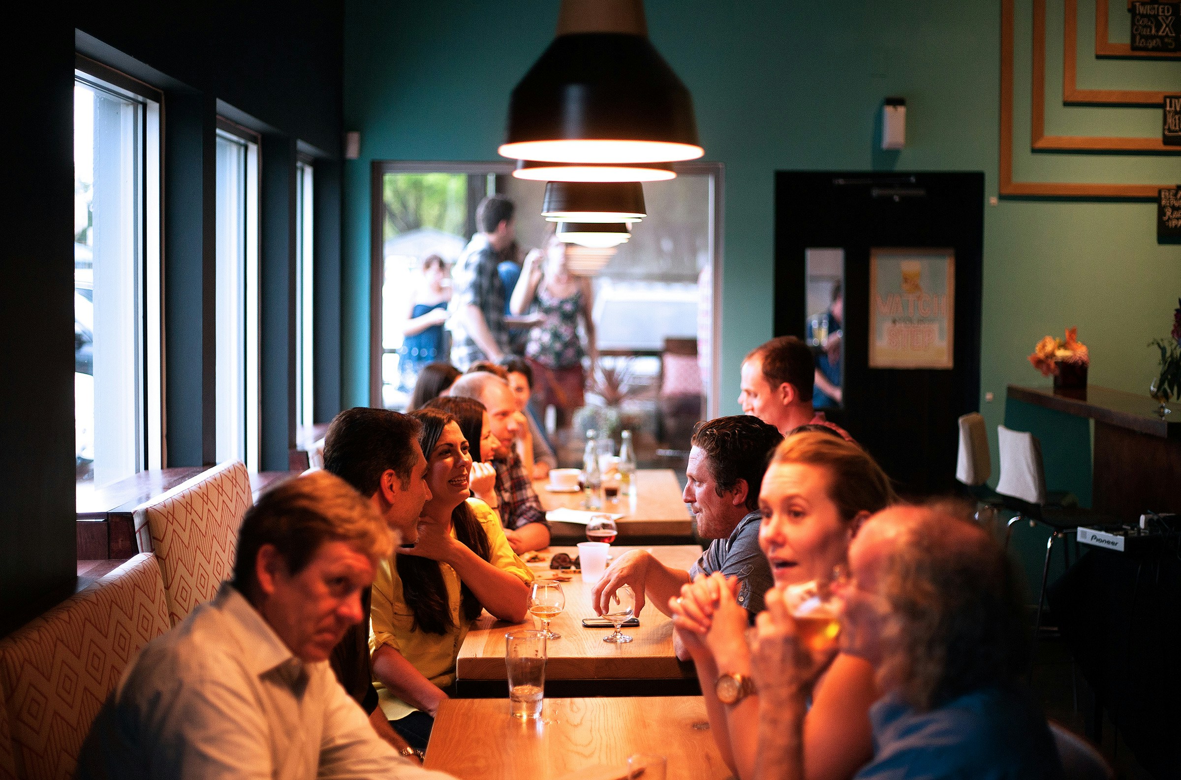 People gathered at a lively table